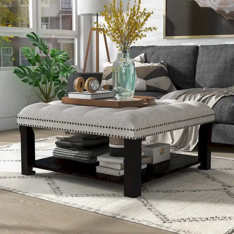 Pouf de rangement cocktail transitionnel en lin capitonné avec clous décoratifs