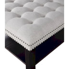 Pouf de rangement cocktail transitionnel en lin capitonné avec clous décoratifs